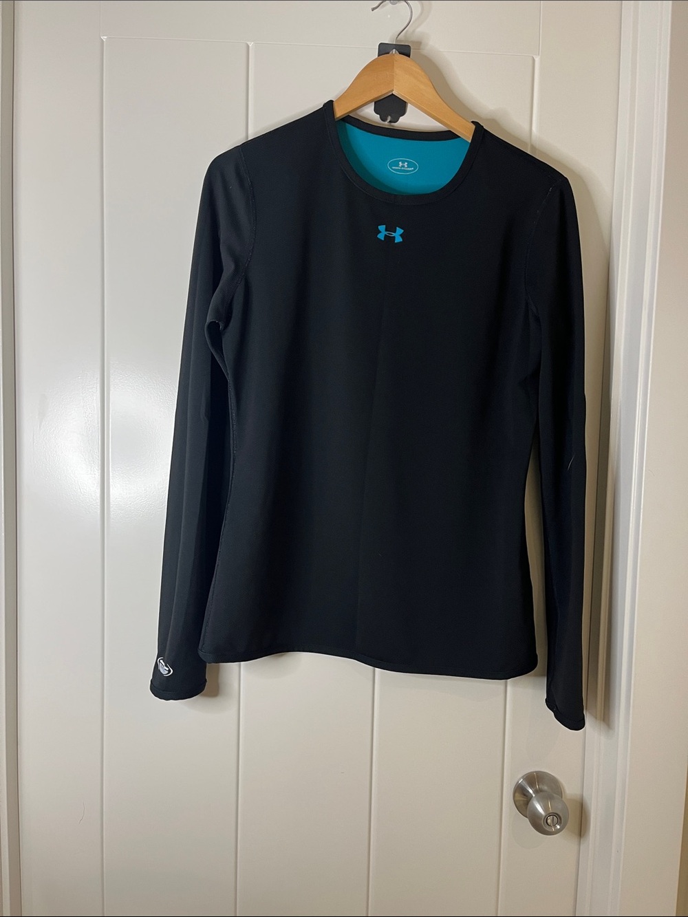 Under Armour Women’s Long Sleeve reversible top - Black with Teal